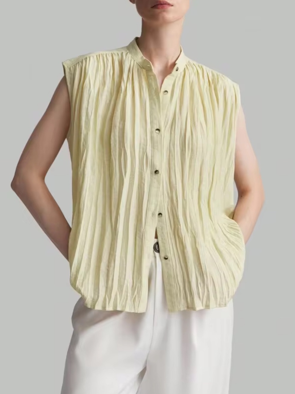 Sleeveless Crinkled Pleated Button-Front Top in Pale Yellow